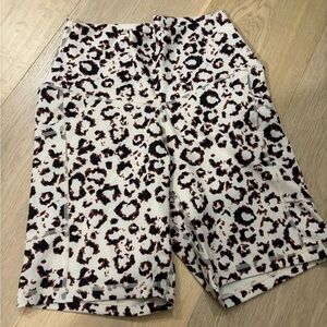 Leopard print running tights with side pockets